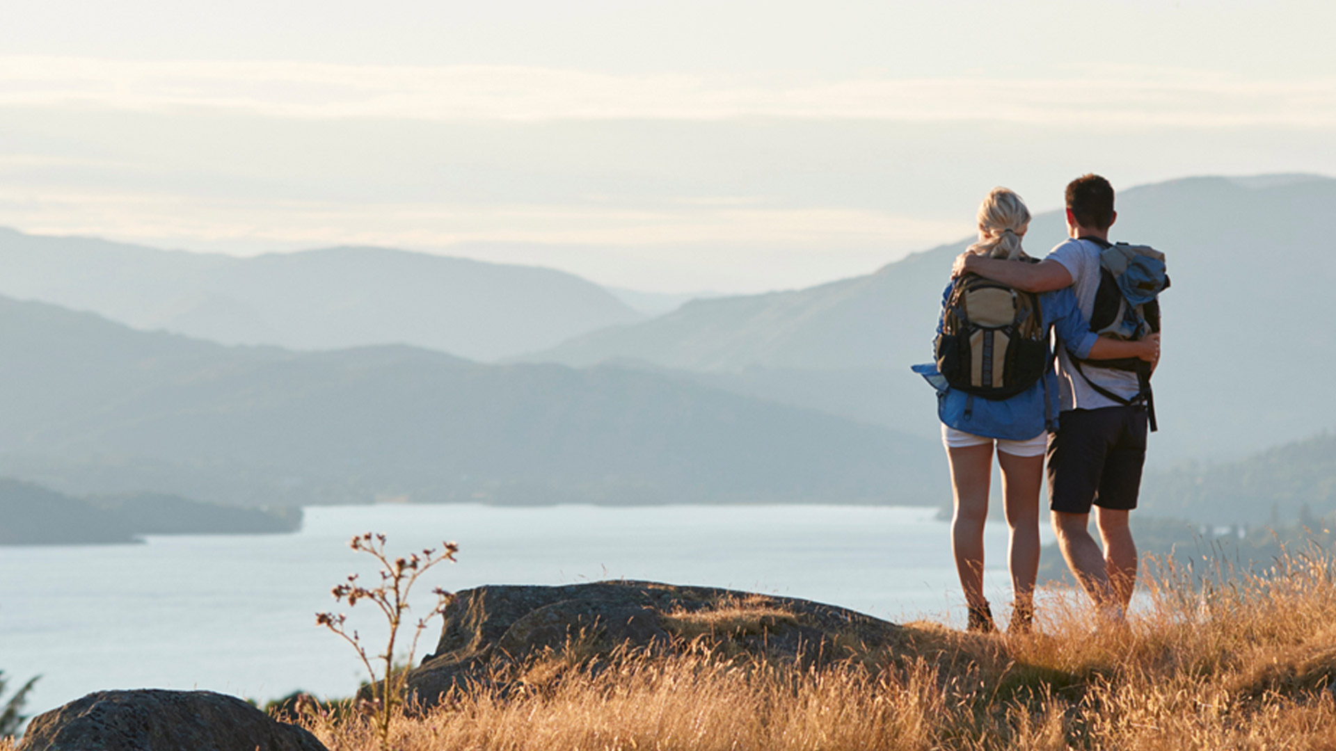 A couple looking over a cliff